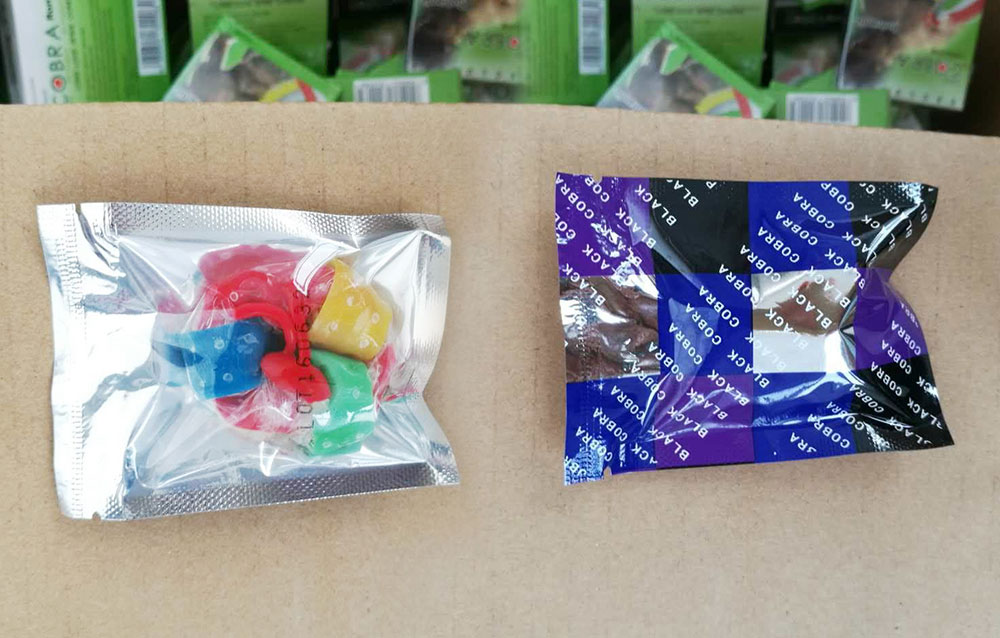 spike condom in transparent-foil-wrapper
